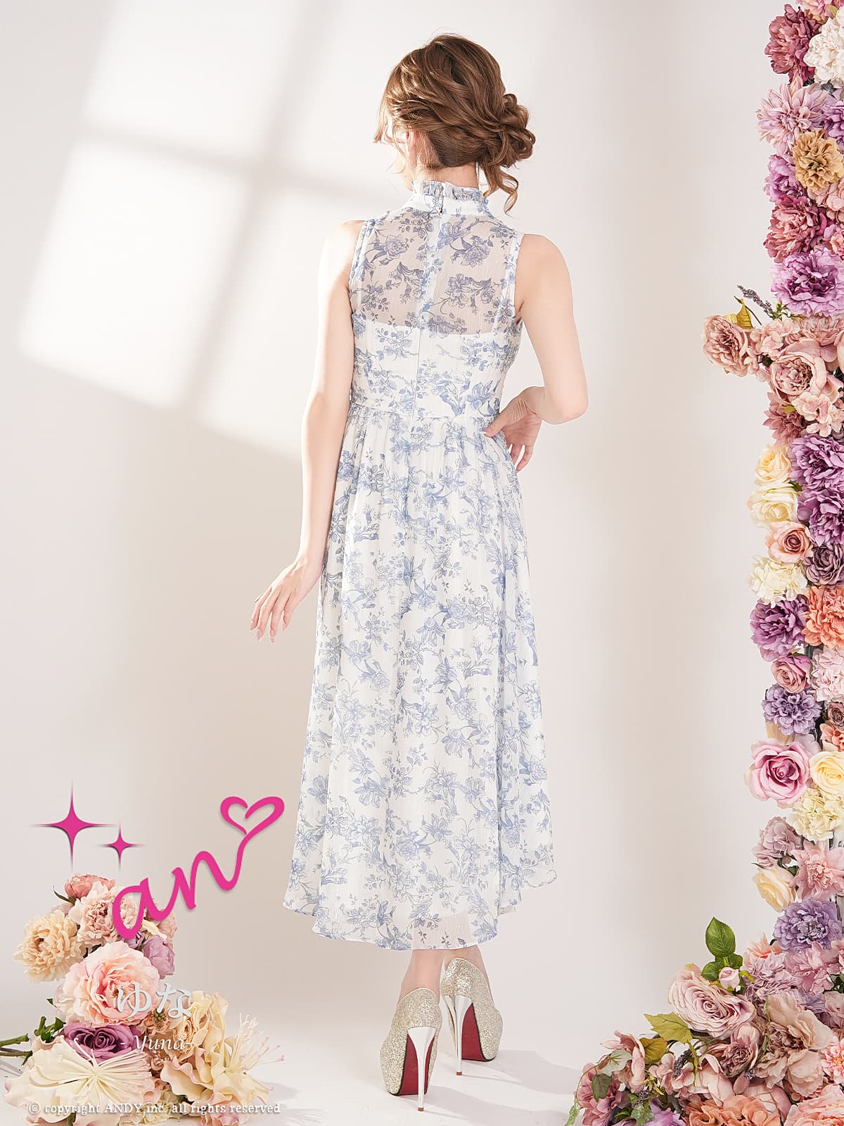 ノースリーブ フラワープリント フリル シースルー ロングテール フレア 膝丈ドレスの全身サイド画像1